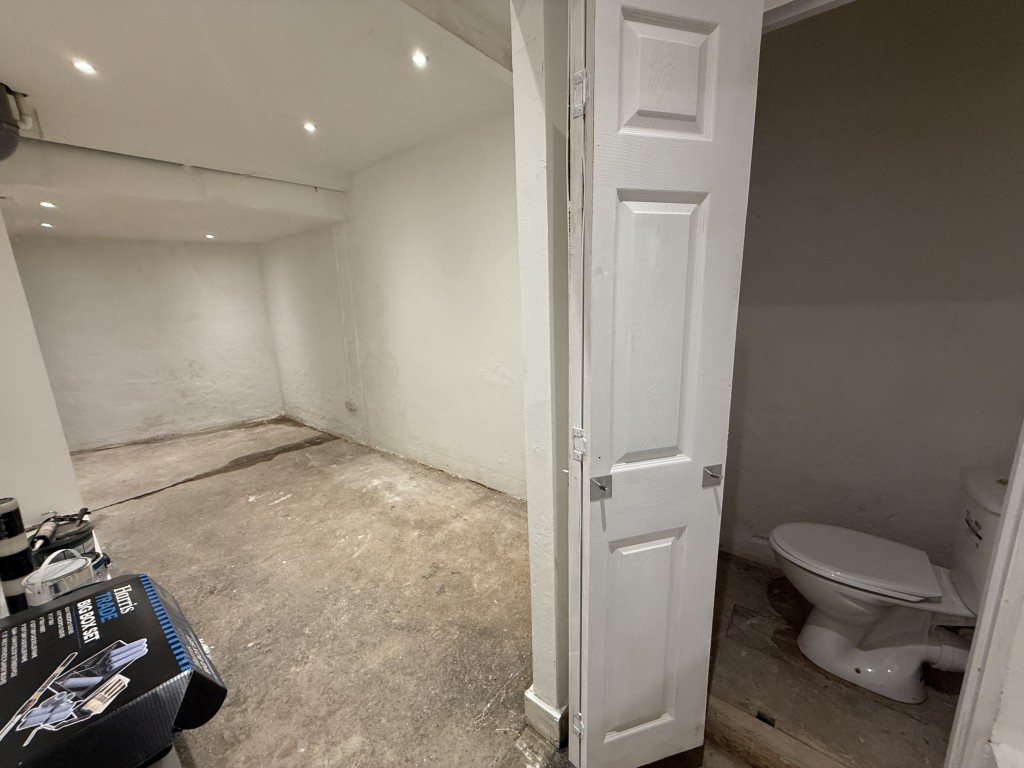 Lot: 5 - VACANT MIXED USE FOUR STOREY PROPERTY WITH FURTHER POTENTIAL - Basement room 2 leading to entrance from rear and WC